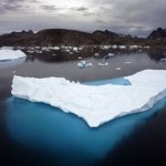 Sunlit Snow Predominant Reason for Arctic Atmosphere Changes