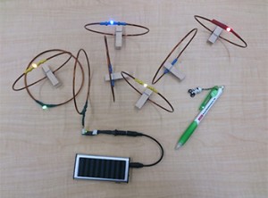 LEDs Lit up by Murata's new DC Magnetic Resonance Wireless Power Transmission