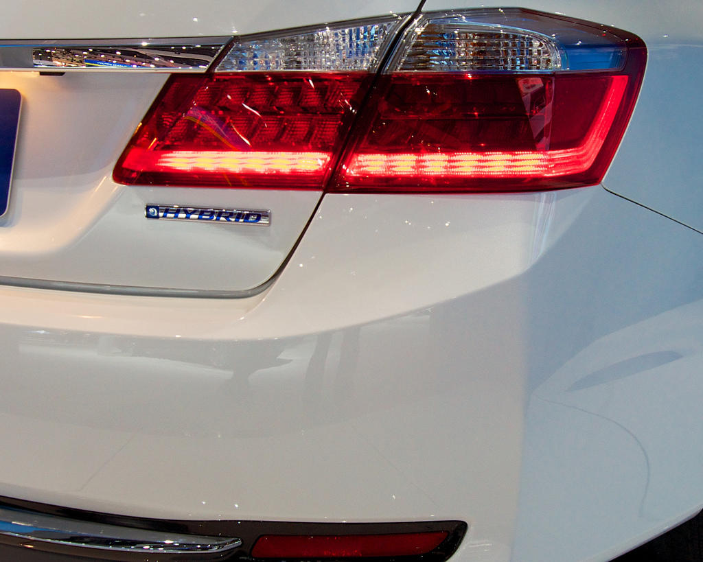 2014 Honda Accord Hybrid is only given away by the "Hybrid" tag.